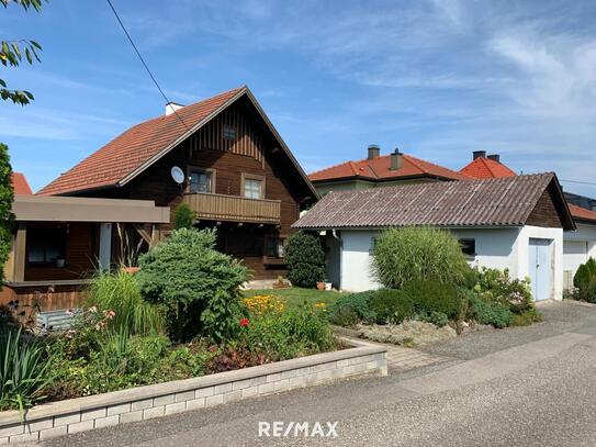 ***OPEN HOUSE Freitag, 6. September von 13 - 17 Uhr*** Gemütliches Holzblockhaus: Idyllisches Wohnen mit guter Anbindung