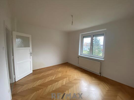 Charmante 3 Zimmer -Wohnung mit Garten und optionalem Parkplatz