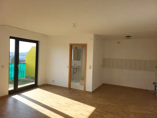 Großzügige Dachgeschosswohnung mit Balkon und schöner Aussicht!