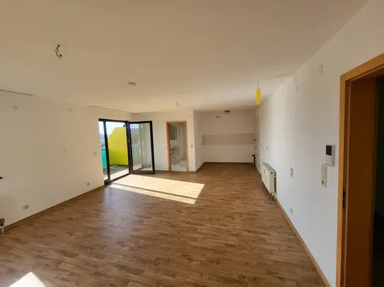 Großzügige Dachgeschosswohnung mit Balkon und schöner Aussicht!