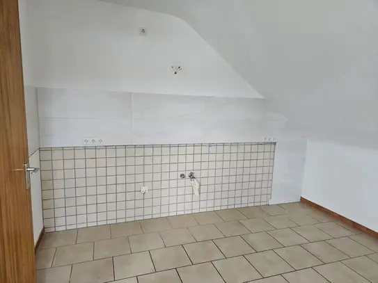 Moderne Dachgeschosswohnung im Grünen