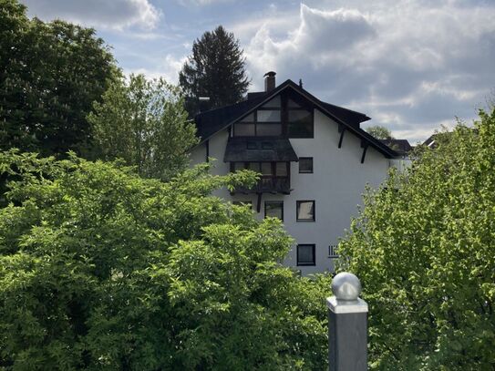 Farmhouse with view of green surroundings