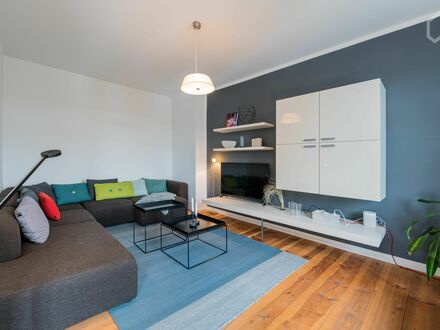 Moderne, helle und ruhige 2-Zimmer-Business-Wohnung mit Balkon im grünen Weißensee