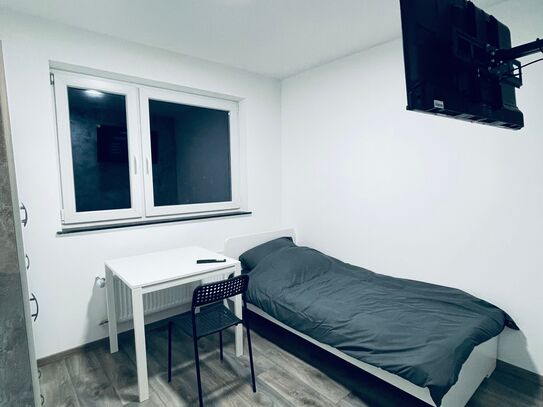 Helles, modernes 4-Zimmer-Apartment mit Einzelbetten, Smart-TVs & malerischem Blick auf die Felder