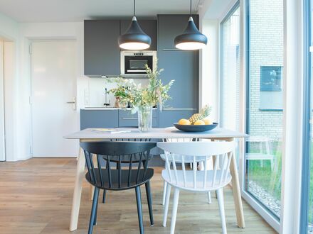 Skandinavisches Designer Appartement mit Terrasse direkt am See