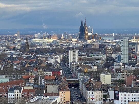 Renovated, bright, central apartment with view over all of Cologne, balcony and underground parking