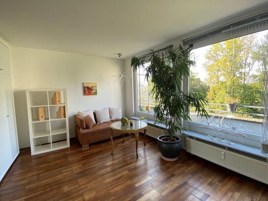 Lichtdurchflutetes Apartment mit Penthouse Charakter