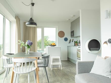 Skandinavisches Designer Appartement mit Balkon direkt am See