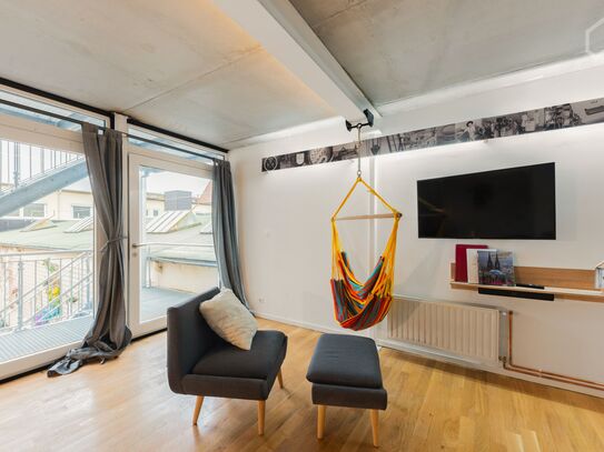 Light-flooded loft with courtyard/balcony in former laundry