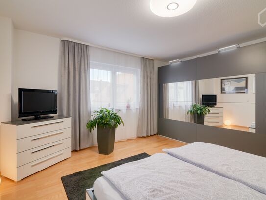 Modern high-class apartment in the cosy greens with a balcony and private parking with E-Charger Wallbox