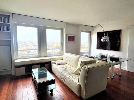 Panoramic Splendor: 13th Floor View of Sacré Coeur Basilica from a Secure Building with Concierge