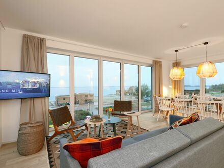 Skandinavisches Designer Penthouse mit Balkon direkt am See