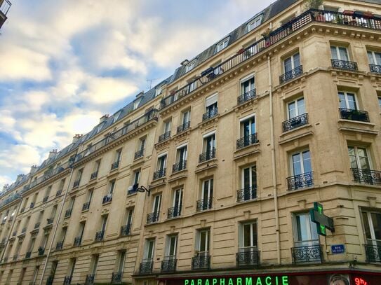 Charming Furnished Apartment with View of the Parisian Rooftops and Sacré-Cœur, Just Steps from Montmartre