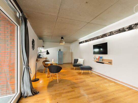 Light-flooded loft with courtyard/balcony in former laundry