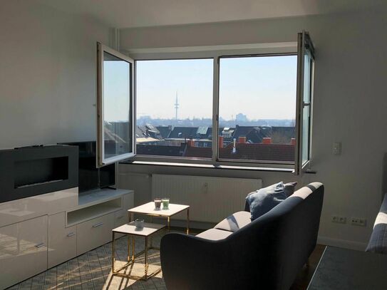 Stilvolles Apartment nah an der Alster mit Ausblick über die Dächer von Hamburg bis zur Elbphilharmonie