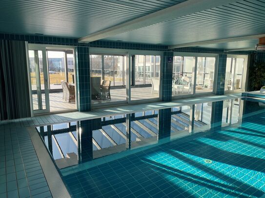 200 sqm apartment south of Munich with pool, fireplace, roof garden, winter garden and double garage