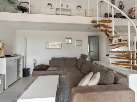 Neuwertige 3-Zimmer-Penthouse-Wohnung mit 30m2 Terrasse , EBK & privatem Tiefgaragenstellplatz in Meerbusch
