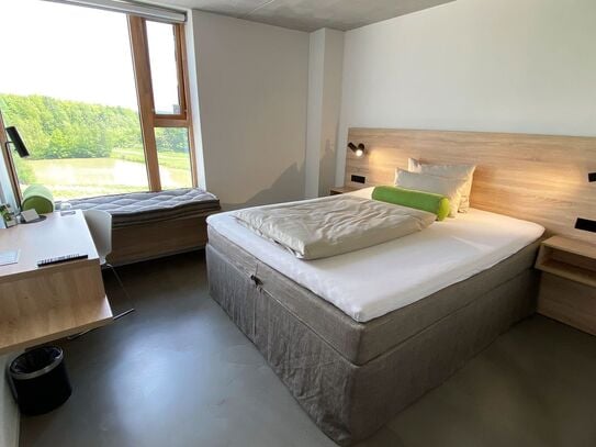 Zimmer für Langzeitaufenthalt mit Luxusbett