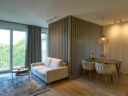 Neubau in urbaner Lage - Stilvoll vollmöbliertes Apartment in 5. Etage mit Balkon und Tiefgaragenstellplatz | Modern bu…