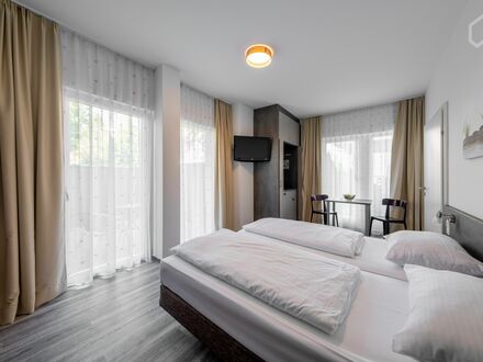 Charmantes Serviced Appartement in perfekter Lage am Schloßpark Nymphenburg, Fitness inklusive