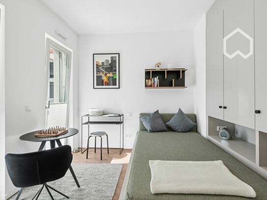 Modernes 1-Zimmer-Apartment mit Terrasse, voll möbliert, zentral und ruhig, Erstbezug