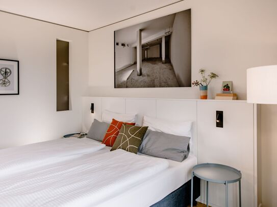 Modernes Serviced Apartment für Zwei am Olympiapark mit Fitnessstudio, nur 9 min zum Hauptbahnhof