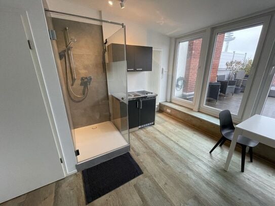 Light-flooded attic studio with a panoramic view over Bremen