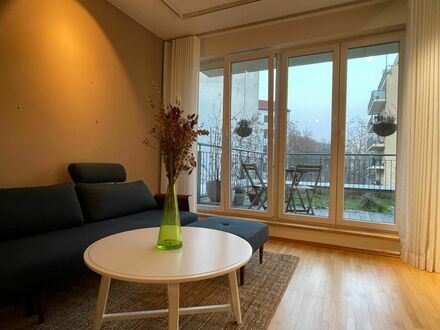 Zentrales, ruhiges 2-Zimmer-Apartment mit Dachterrasse und Blick ins Grüne