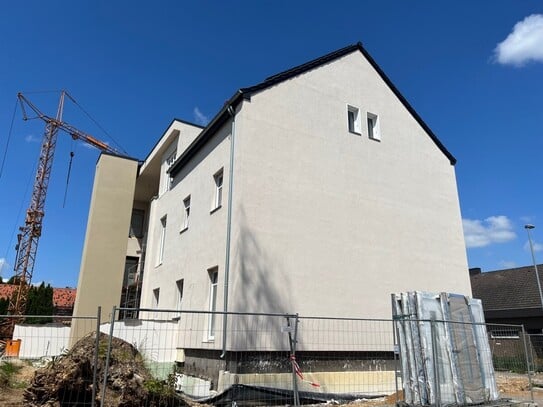 Ein architektonisches Highlight: Wohnen im historischen Schulgebäude mit modernster Technik!