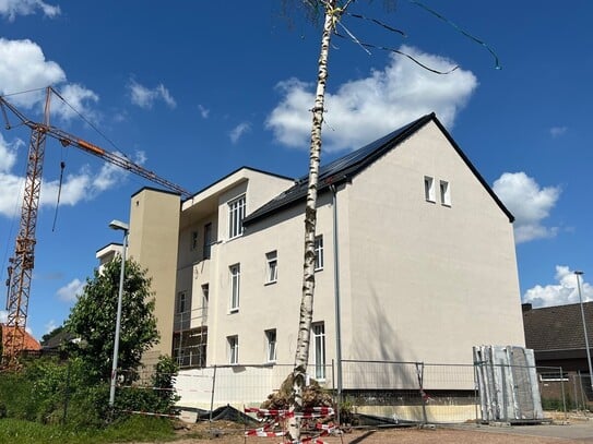 Ein architektonisches Highlight: Wohnen im historischen Schulgebäude mit modernster Technik!