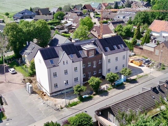 Ein architektonisches Highlight: Wohnen im historischen Schulgebäude mit modernster Technik!