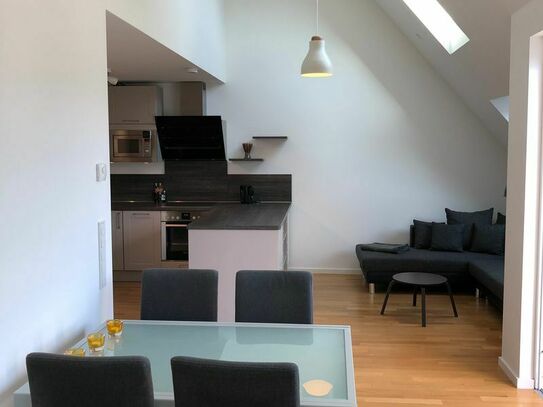 Modern and stylish top floor 1-bedroom apartment in Berlin Lichterfelde with a terrace