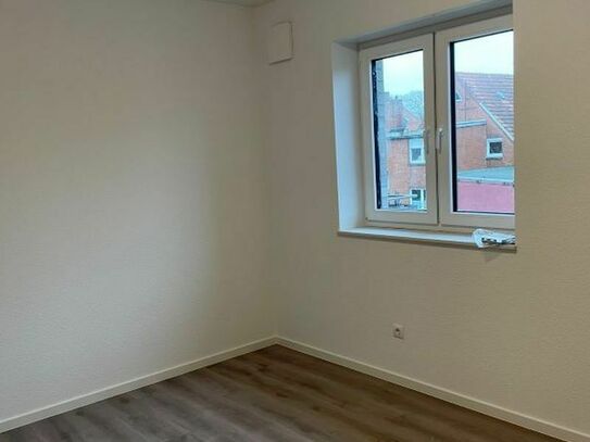 ***Neubau-Obergeschosswohnung mit Balkon in zentraler Wohnlage von Aschendorf***