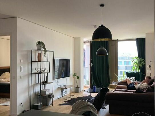 Bright & furnished home in Mitte w/ Loggia, Gym, Skygarden, Concierge & Parking