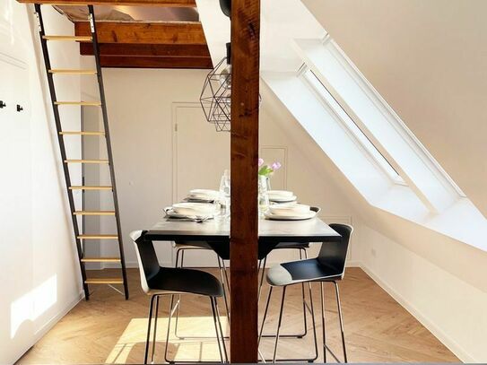 Stylish loft apartment with garden use