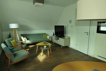 Fully furnished attic apartment, with comprehensive equipment, close to the Wolfsburg hospital.