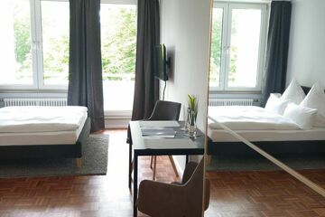 Inclusive rent. - Business apartment with underground parking and balcony