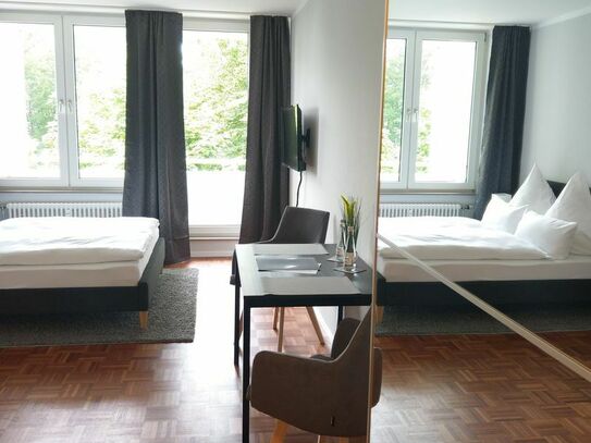 Inclusive rent. - Business apartment with underground parking and balcony