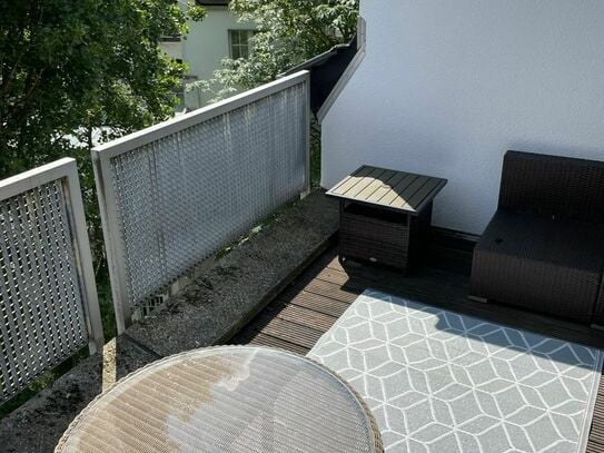 Sunny terrace apartment above the rooftops of Düsseldorf