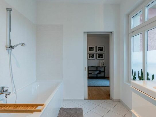 Spacious, light-flooded penthouse in Berlin-Mitte with fireplace.