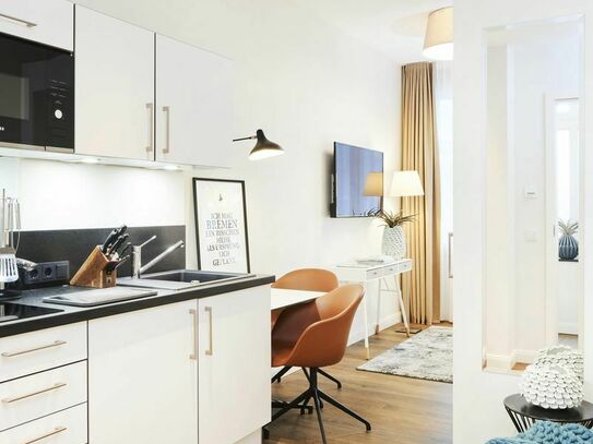 Designer apartment in the centre of Mitte with spa and fitness room use