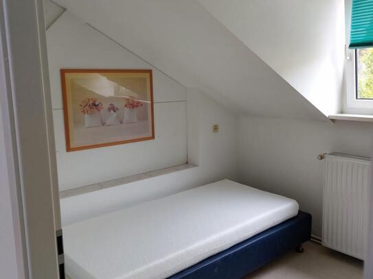 lovely bed in a shared bedroom in Adlershof