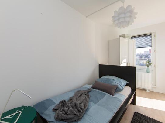 Cool single bedroom in a 4-bedroom apartment near S+U Neukölln transport station