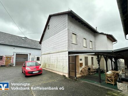 Einfamilienhaus mit Scheune und großem Garten!