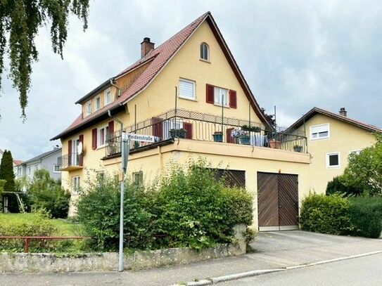 Dreifamilienhaus mit Doppelgarage und Werkstatt mit Büro