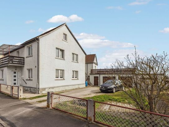 Einfamilienhaus mit Einliegerwohnung und großem Potenzial in Langenfeld.