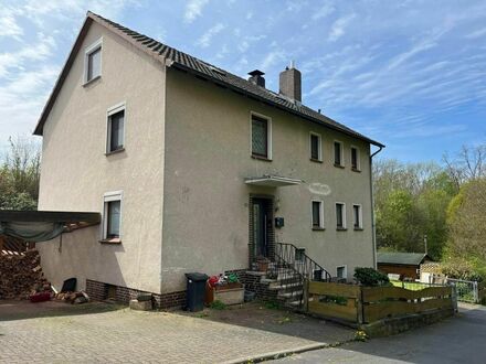 5-Zi.-Eigentumswohnung mit 2 Bädern, Küche, Balkon, großem Garten, Garage, Carport, Schuppen