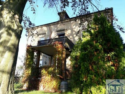 Großzügiges Wohnhaus in zentraler Lage mit parkähnlichem Garten