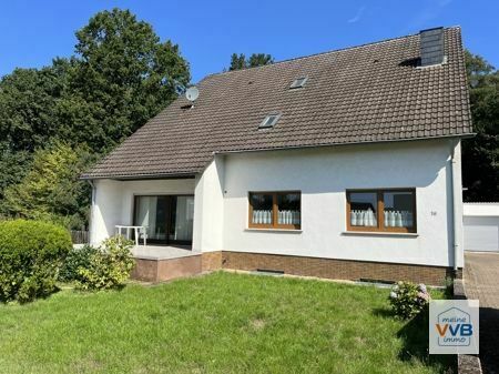 Freistehendes Ein- Zweifamilienhaus mit Garten und Garage in 
Bestlage von Saarwellingen