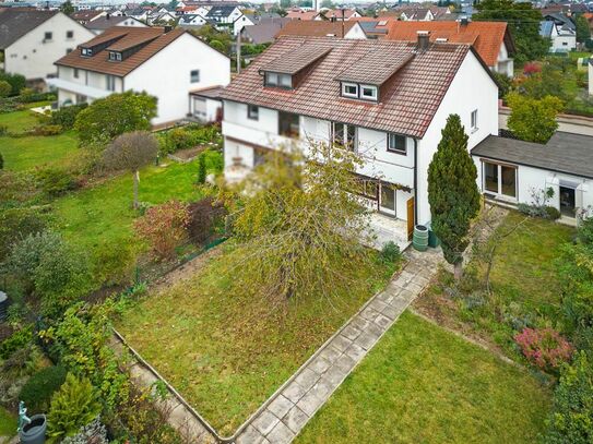 Zur Neugestaltung: Doppelhaushälfte mit Garten und Garage für die Familie!